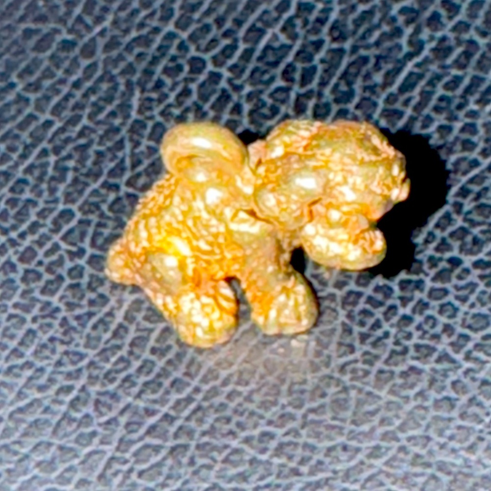 14k yellow gold figural dog charm with articulated bobble head